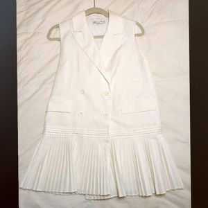 Christian Dior Designer White Sleeveless Double Breasted Blouse w Pleated Hem.